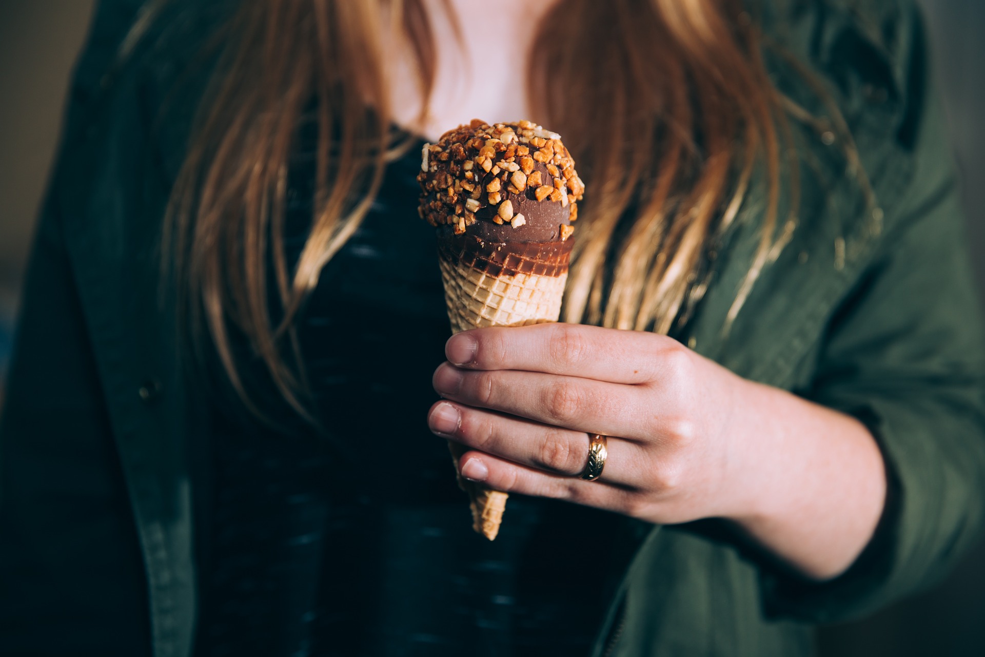 Woman Holding Cone of Ice Cream