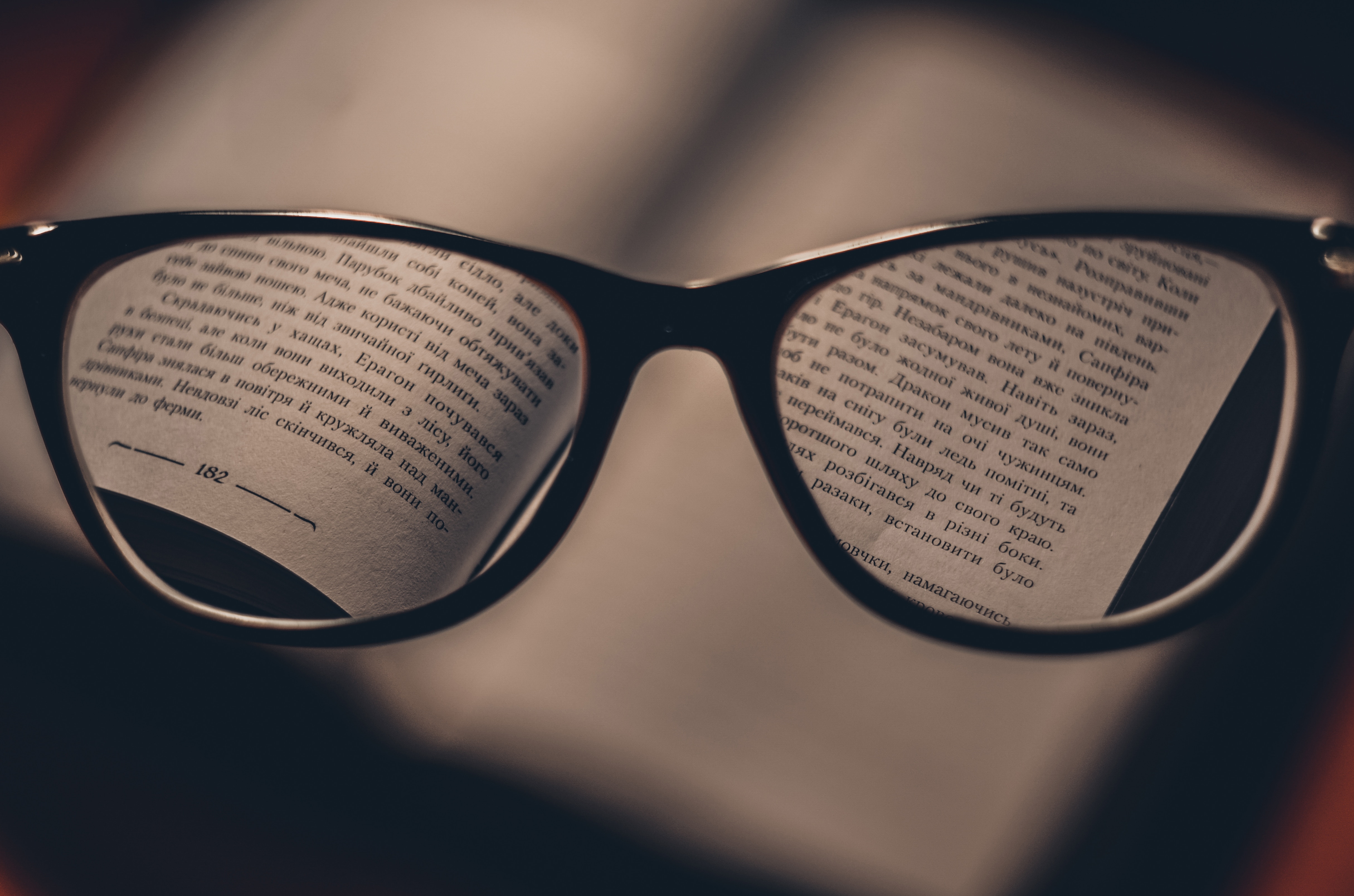 spectacles and a book